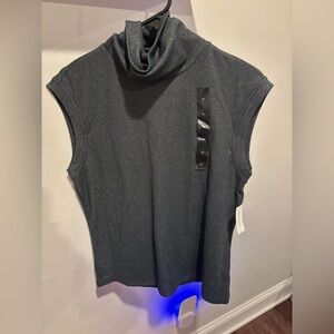 Banana republic sleeveless sweater -look for skirt with same materials but gold